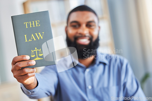 Image of Law, book and happy portrait of a man with the rules or research on legal constitution, regulation or policy from government. African businessman, lawyer or attorney with knowledge of justice