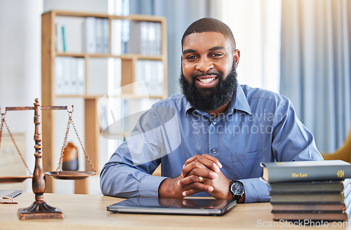 Image of Happy black man, portrait and lawyer at desk for consulting, justice and pride in law firm in Nigeria. Attorney, advocate and businessman in office for legal advice, court meeting and constitution