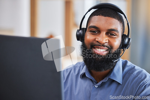 Image of Consultant portrait, man and call center, communication or technical support for e commerce or customer service. Face of agent, web IT advisor or african person helping or online solution on computer