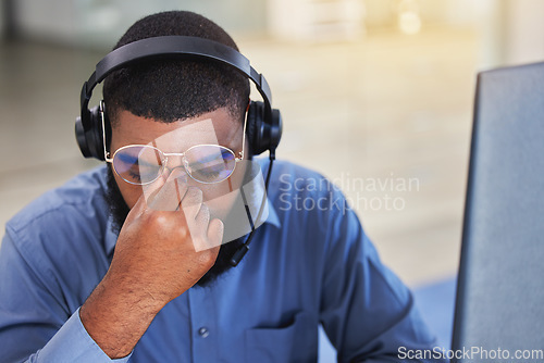 Image of Call center, business man and headache, pain or stress for communication mistake, error and sales crisis. Tired agent, consultant or sad person in glasses, computer and health risk in telemarketing
