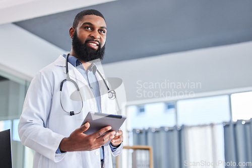 Image of Doctor, man and tablet for hospital, healthcare or clinic services, online management and history or patient charts. Medical professional or african person on digital technology of health information