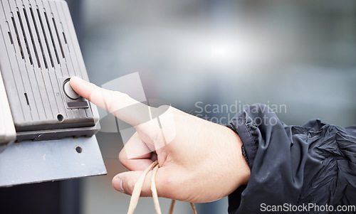Image of Finger, button and intercom with a person closeup outdoor for entrance through a security communication system. Hand, office building or press with an adult in the city for access via a buzzer