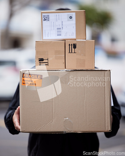 Image of Person, cardboard and boxes delivery or courier service for shopping, logistics or supply chain management outdoor. E commerce, cardboard package and product for urban city shipping and stock worker