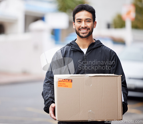 Image of Delivery man, box and courier service for distribution, logistics and retail supply chain in outdoor portrait. E commerce, cardboard package and product, city shipping and happy face of stock worker