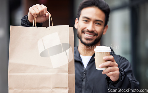 Image of Breakfast delivery, portrait and a man with a coffee, food or ecommerce service from a restaurant. Happy, commercial and an Asian worker with lunch or dinner from a courier from a cafe in the morning