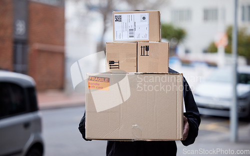 Image of Person, boxes and delivery or courier service for online shopping, logistics or supply chain management outdoor. E commerce, cardboard package and product for urban city shipping and stock worker