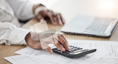 Image of Documents, calculator and business person hands for financial planning, taxes management and laptop. Accountant or worker with numbers for budget, data or accounting paperwork on computer and desk