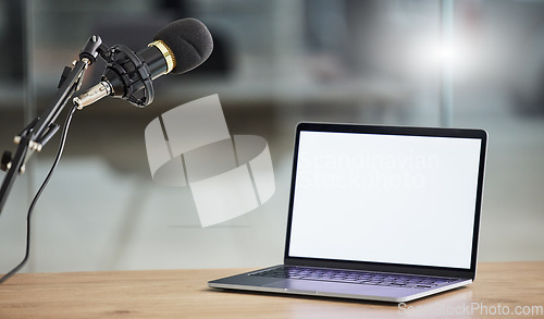 Image of Laptop screen, mockup and microphone, radio or podcast with audio equipment, technology and marketing for show. Multimedia, communication and email with website design layout, news and about us on pc