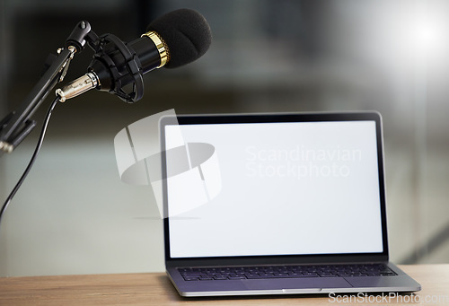 Image of Microphone, laptop mockup and screen with audio, radio or podcast equipment with technology and show marketing. Multimedia, communication and email with website design layout, news and about us on pc