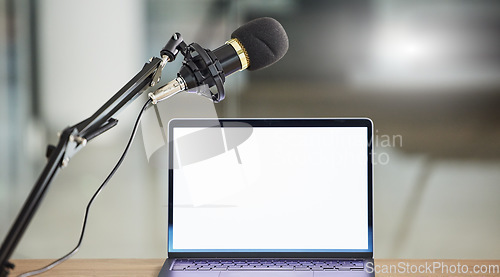 Image of Laptop screen, mockup and mic for radio or podcast with audio equipment, technology and marketing for show. Multimedia, communication and email with website design layout, news and about us on pc