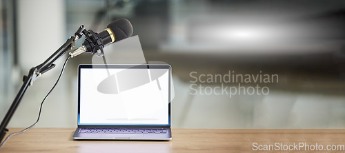 Image of Laptop, screen with mockup and microphone, radio or podcast with audio equipment, technology and advertising. Multimedia, communication and email with website design layout, news and about us on pc
