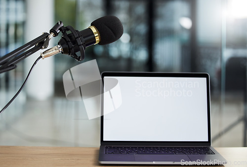 Image of Laptop screen, mockup and microphone, audio equipment for radio or podcast with technology and advertising. Multimedia, communication and email with website design layout, news and about us on pc