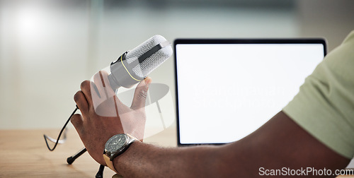 Image of Podcast, tablet and mockup with hand of person for live streaming, radio and speaker. Social media, influencer and communication with closeup of man for microphone, digital and production banner