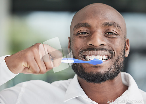 Image of Black man, face and brushing teeth with toothbrush, dental and health, hygiene and grooming. African male person, portrait and toothpaste with oral care, orthodontics and routine with fresh breath