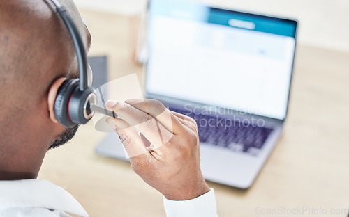 Image of Back of man, call center and communication on laptop for CRM questions, telemarketing and customer service. Sales consultant, help desk or lead generation on microphone at computer for FAQ support