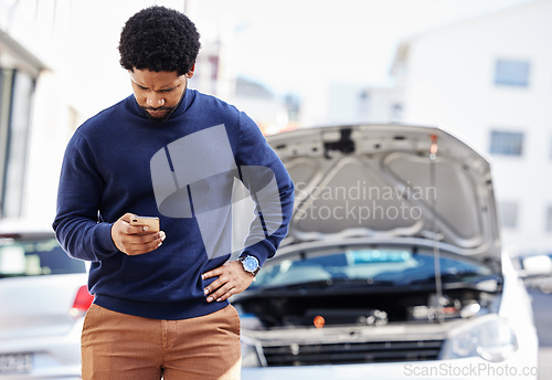 Image of Black man with phone, car breakdown and typing in road with contact, auto insurance and travel. Motor problem, transport and frustrated driver on road checking mobile app for engine repair service.