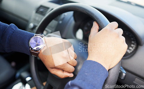 Image of Hands, steering wheel and check watch for driver, travel schedule or traffic on street. Person, chauffeur or transport employee with clock, time or vehicle for journey, service or road trip adventure