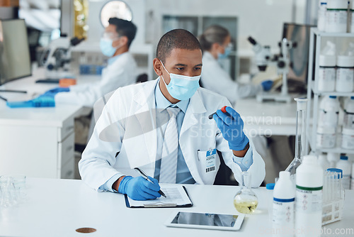 Image of Science, writing and man with blood work for doctor research and study in clinic. Lab expert, data analysis and healthcare professional with innovation and notes for covid test of dna scientist