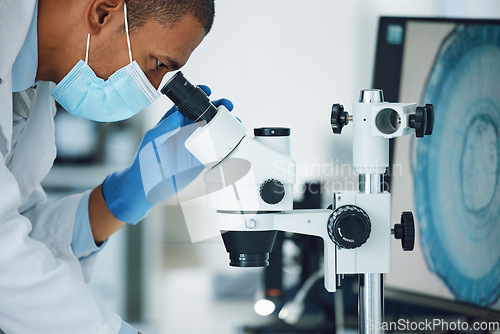 Image of Microscope, science and man with mask on face in laboratory to review particles, medical test and biotechnology. Scientist, microbiology and investigation of innovation, dna analysis and development