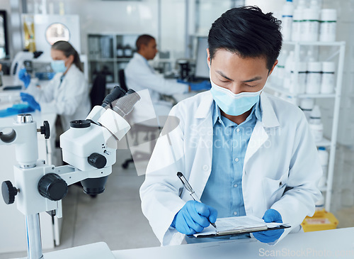 Image of Laboratory, man and scientist writing clipboard information, healthcare research or medicine development project. Science lab solution, pharma checklist and person work on medical hospital results