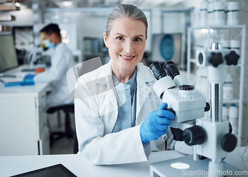 Image of Microscope, scientist and portrait of senior woman in laboratory to review virus research, medical test and biotechnology. Science, microbiology and happy female professor planning expert assessment