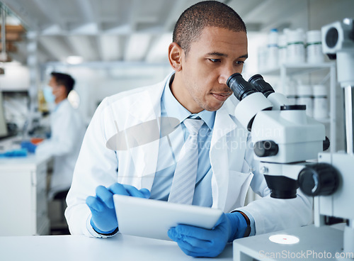 Image of Microscope analysis, man and laboratory scientist working on healthcare research, pharma project or test sample. Science experiment, tablet and person typing results of hospital check, study or exam