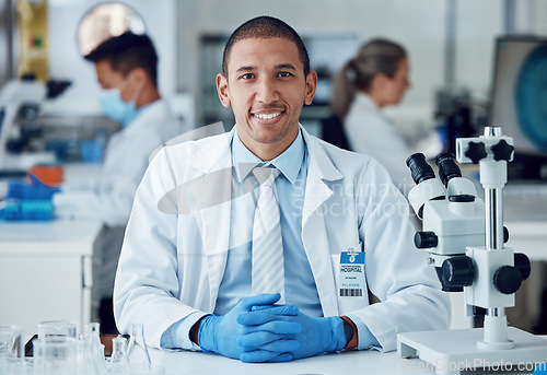 Image of Science portrait, happy man and laboratory scientist working on healthcare research, medical development or project. Science career, job happiness and hospital person work on biotechnology study