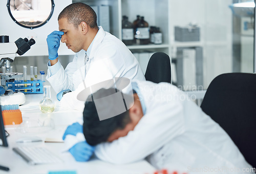 Image of Science, sleeping man and lab scientist burnout, mental health anxiety or depressed over crisis, fatigue or test fail. Laboratory, pain and person tired after research, overworked or overwhelmed