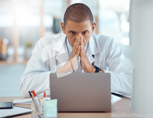 Image of Hospital, laptop and stress with burnout, internet issue and mistake with glitch, headache and frustrated. Male person, medical professional or employee with a pc, migraine and 404 error with fatigue