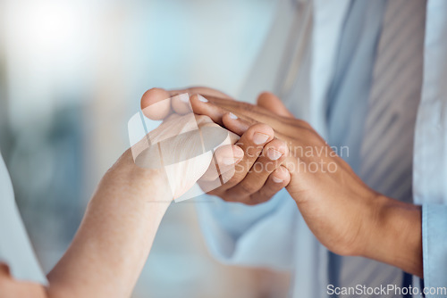 Image of Support, care and hands holding for healthcare trust by doctor with patient for love, help and hope in a hospital. Cancer, medical and closeup of professional with comfort for person in a clinic