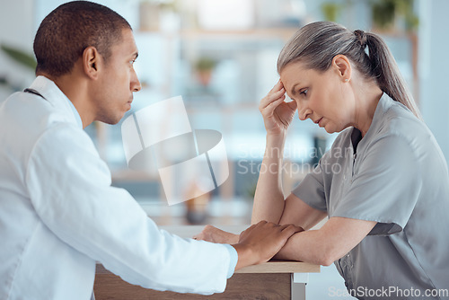 Image of Sad, healthcare and a doctor with support for a woman, medical results or feedback in an office. Mental health, hospital and a senior patient speaking to a man at a clinic with depression or mistake