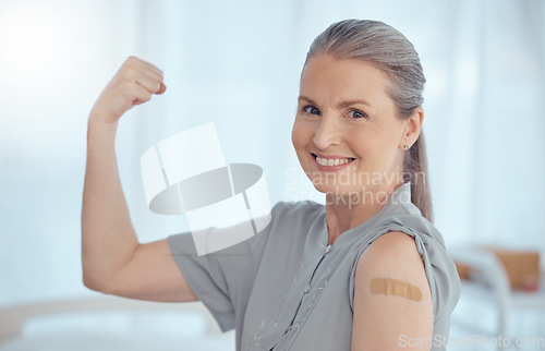 Image of Strong, portrait and a woman with a plaster from a vaccine, healthcare and safety from virus. Happy, muscle and an elderly or senior hospital patient with medical insurance, motivation or vaccination