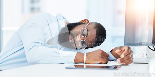 Image of Sleeping, burnout and tired businessman in office overwhelmed by deadlines with fatigue at desk. Lazy worker, depressed consultant or exhausted black man resting or taking nap in overtime with stress