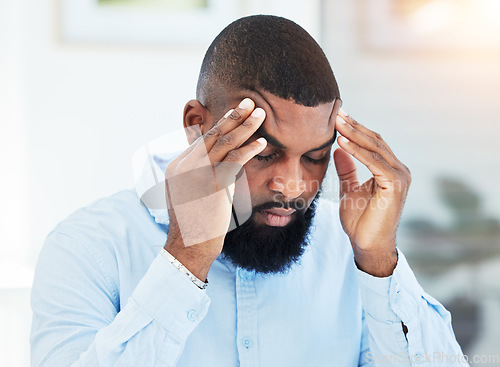 Image of Stress, anxiety or tired businessman with headache overwhelmed by problems, mistake or failure. Stock market crash, burnout or frustrated black man trader overworked in office with fatigue or failure