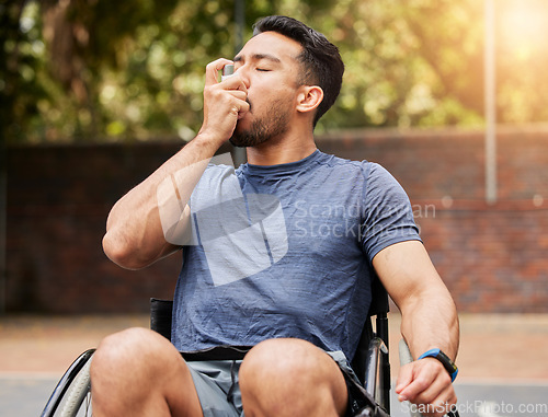 Image of Lung, breathing and asian man in a wheelchair with asthma, pump at outdoor court for health and fitness routine. Breathe, inhaler and male with disability at a park with allergies while training