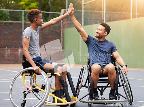 Image of Sports, wheelchair basketball court and happy people high five, celebrate success and smile for match competition win. Player celebration, winner and athlete with disability excited for achievement