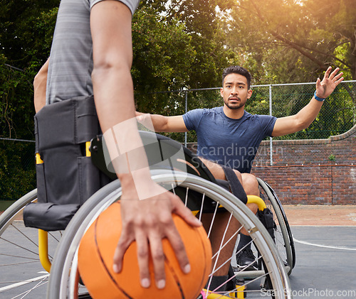 Image of Sports competition, wheelchair basketball court and people playing competitive match, defend or practice attack. Athlete player, commitment and active men with disability, training and exercise