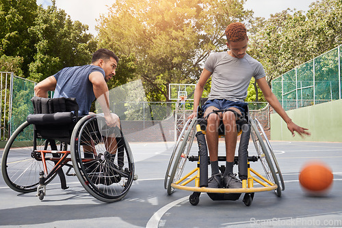 Image of Sports competition, wheelchair basketball player and people playing competitive match, game or action challenge. Athlete player, dynamic mobility and active men with disability, training and exercise