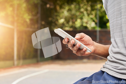 Image of Smartphone in hand, person outdoor and typing, social media scroll and communication with mobile app. Using phone while at sports playground, texting and online chat with contact and technology