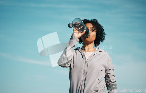 Image of Woman, drinking water and health with fitness, hydration and workout outdoor. Plastic bottle, liquid and wellness with female athlete in nature, exercise and training with h2o and mockup space