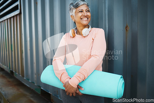 Image of Senior woman, yoga mat and exercise with smile outdoor, healthy and active life with happiness. Fitness, wellness and female person with workout equipment, thinking and training with retirement