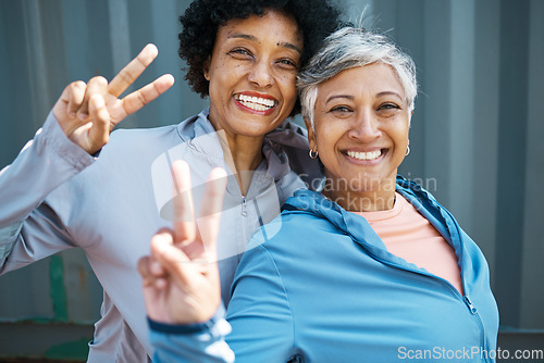 Image of Fitness, peace sign and portrait of senior women bonding and posing after a workout or exercise together. Happy, smile and elderly female friends or athletes with hipster hand gesture after training.