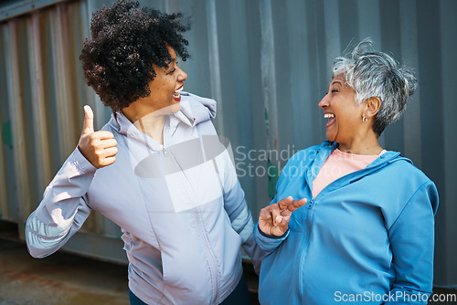 Image of Happy, sports and senior women friends bonding and posing after a workout or exercise together. Happiness, smile and elderly female athletes with hand signs in sportswear after training by a wall.