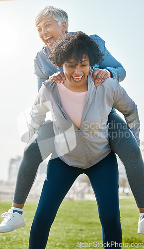 Image of City, funny and senior friends piggy back together or women playing, crazy and laughing after outdoor exercise. Health, wellness and goofy elderly people bonding with humor or comedy after workout