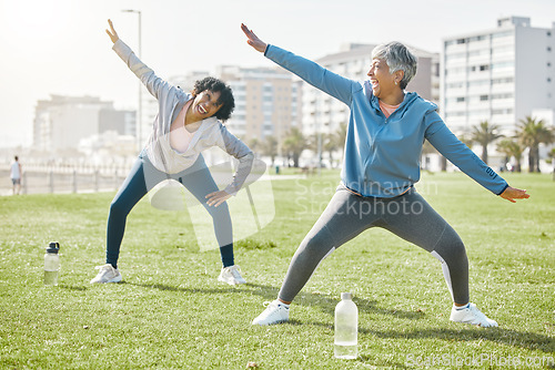 Image of Women, senior and stretching in park, laugh with fitness and wellness, flexibility and start workout outdoor. Female people, friends warm up together and comedy with training and exercise in nature