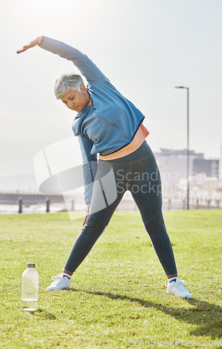 Image of Senior woman, stretching and exercise in park with health, wellness and training in nature. Pilates, body and female person outdoor, fitness and warm up with workout routine, vitality and active