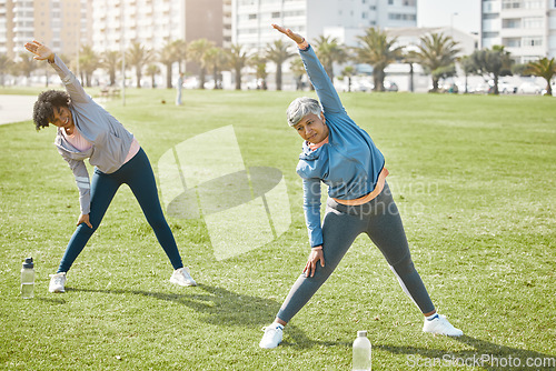 Image of Women, elderly and stretching in park, exercise and wellness with flexibility and start workout outdoor. Female people, friends with pilates or running in nature, training and fitness with vitality