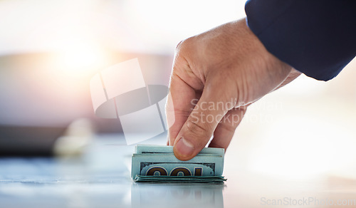 Image of Hands of man with cash, notes and dollars in on desk in trade office with profit, bonus deal and financial growth. Money stack, bills and banking, payment and financial budget investment opportunity.