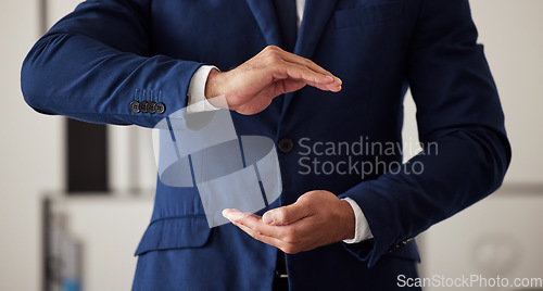 Image of Hands, finance and a business man in the office closeup to offer cover for security or safety. Insurance, support and hand gesture with a male employee working in an investment agency for protection