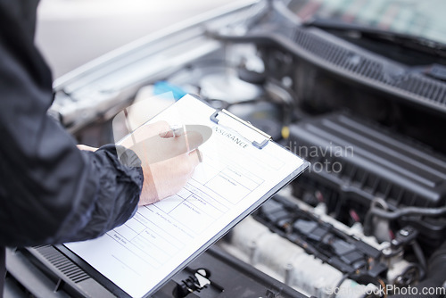 Image of Checklist, car insurance and man writing on documents for compliance, maintenance and engine control. Vehicle, inspection and hand of male mechanic with paper form for information, note and claim